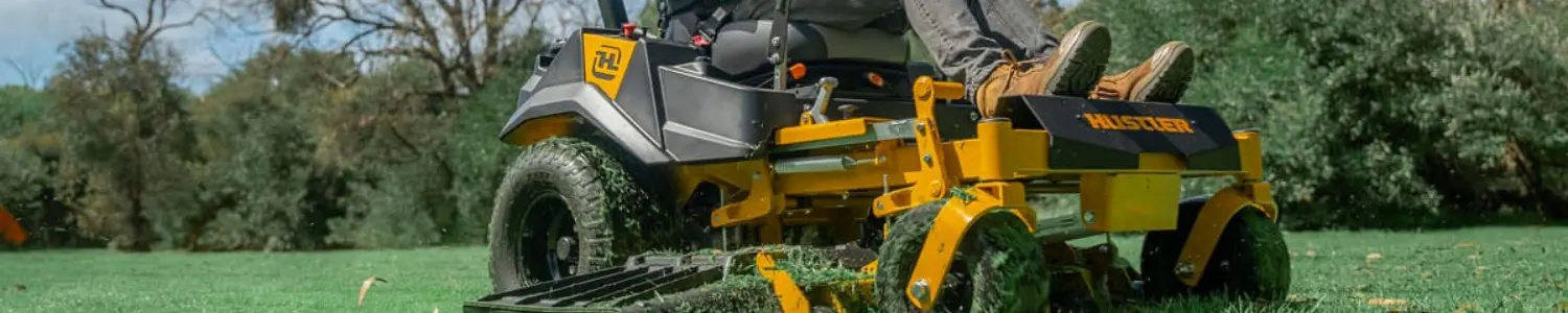 Banner featuring a Hustler zero-turn lawn mower cutting grass
